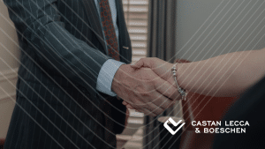 Workers' Compensation Attorney and Client Shake Hands to Begin Process